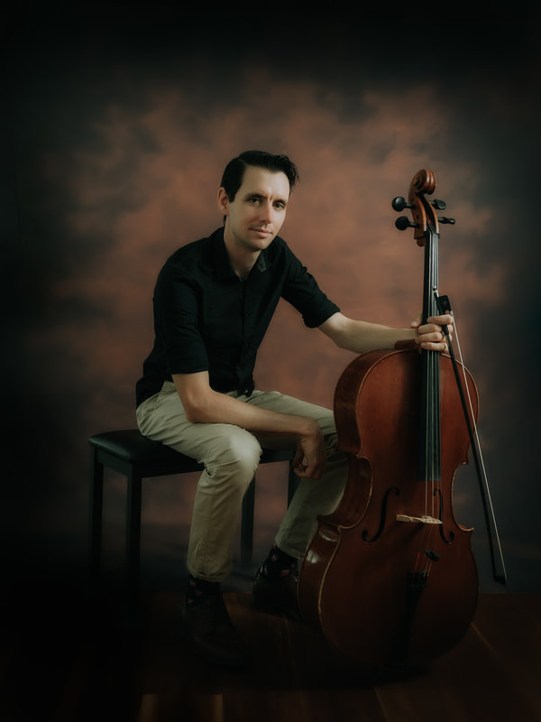 Brisbane portrait photo of a cellist, Andrew. Moody and traditional. 